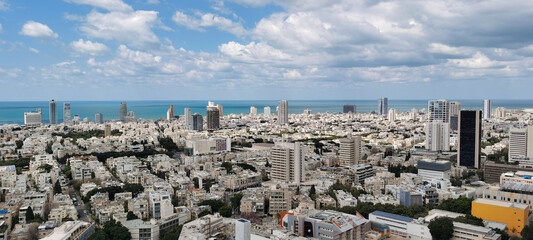 Israel. Tel Aviv. View of the city from a height. The Mediterranean. The sky with beautiful clouds.