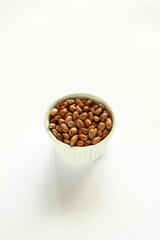 Brazilian beans in a bowl. Carioca beans isolated.