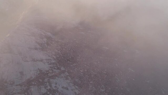 Aerial drone shot of the Prophet Elijah church and cabins on the summits of Mount Olympus in Greece