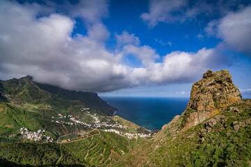Fototapeta na wymiar Aerial view of the rocky shore of Anaga Rural Park, Tenerife, Canary islands under blue cloudy sky