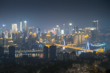 Illuminated modern city at night