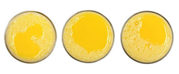 Set orange juice with bubbles in glass cup isolated on white, top view