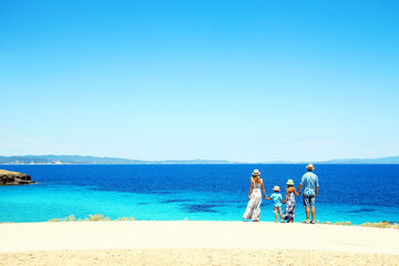happy family near the blue sea coast