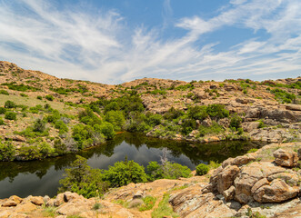 Sunny view of the Treasure Lake landscape of Wichita Mountains