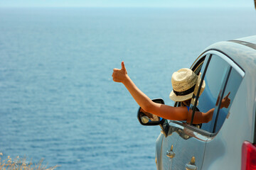 driver in car at sea