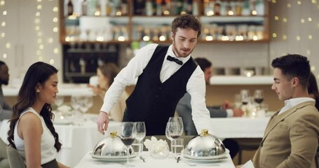 Serve, waiter with food or couple in restaurant in celebration of happy marriage anniversary at dinner at night. Serving, romantic man or woman fine dining eating or bonding on date on valentines day