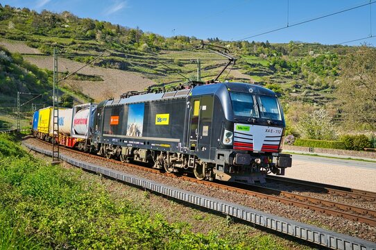 Class 193 (Vectron) electric locomotive of the BLS Cargo company of freight services on the road