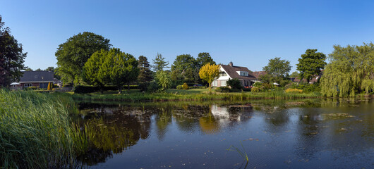 Lake and houses. Uffelte Drenthe Netherlands. Panorama.