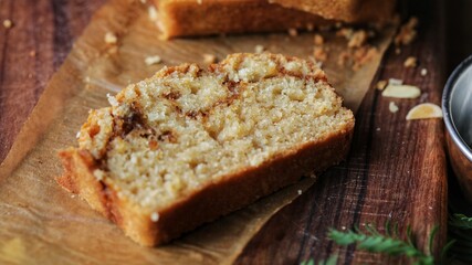 Closeup shot of the sweet egg-free bread made with cinnamon and topped with almond flakes