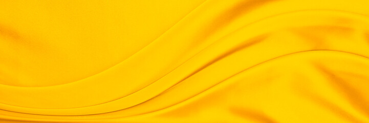 yellow gold satin texture that is white silver fabric luxurious shiny that is abstract silk cloth...