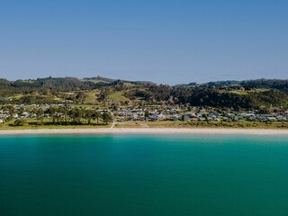 Aerial view of the sea and Cooks Beach, Coromandel Peninsula in New Zealand's North Island