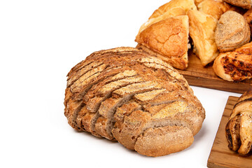 Sliced bread with a crispy brown crust on white background.