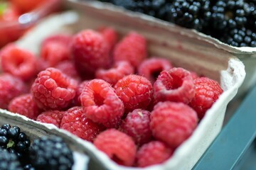 Closeup of raspberries in a tray