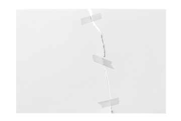 Torn sheet of paper glued with adhesive tape, cut out