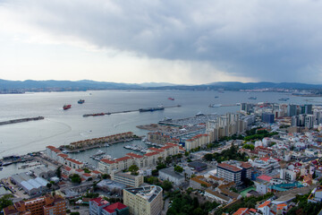Obraz premium Aerial view of Gibraltar, Algeciras Bay and La Linea de la Concepcion from the Upper Rock. View on coastal city from above