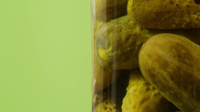  Salted pickles in jar can, Cucumbers preservations, conservation. Salted, Hungarian pickled cucumbers in a jar on an old wooden table in the garden with herbs, dill, garlic