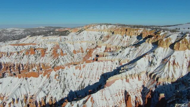 Bird's eye view of Rocky mountains covered with snow in Southern Utah near Brian Head in winter