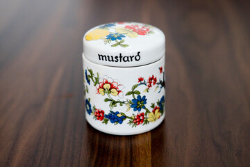 floral-patterned mustard storage container made of porcelain