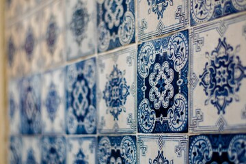 Selective shot of an entirely decorated wall with Azulejo tiles in Lisbon, Portugal