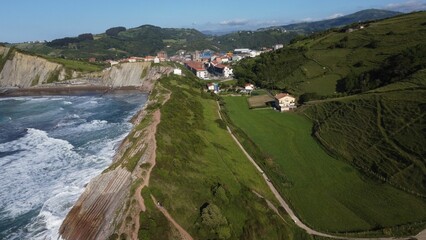 Fototapeta na wymiar Drone shot of a coastline Flysch trail on a sunny day