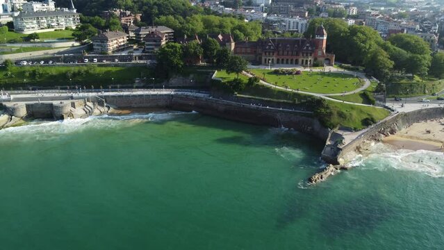 Drone shot of the Miramar Palace in san Sebastian, Spain by rive water