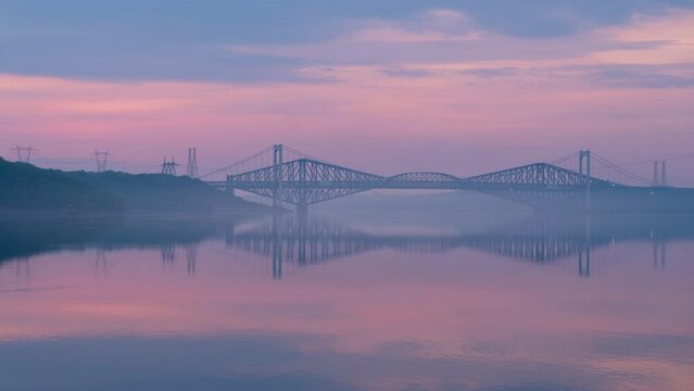 Timelapse of a bridge at sunrise
