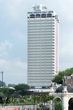 Vertical shot of the Kuala Lumpur City Hall (Dewan Bandaraya Kuala Lumpur) tower against a blue sky