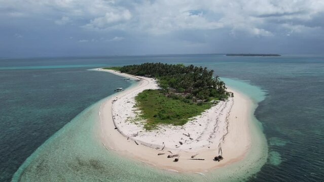 Aerial video panning around one of the Balabac islands