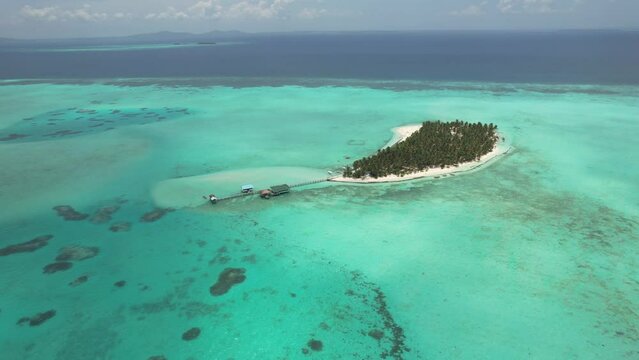 Aerial video panning around one of the Balabac islands