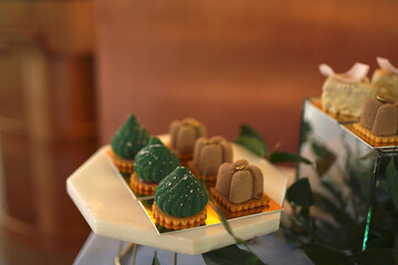 Cookies and cakes on the buffet table. Sweet table.