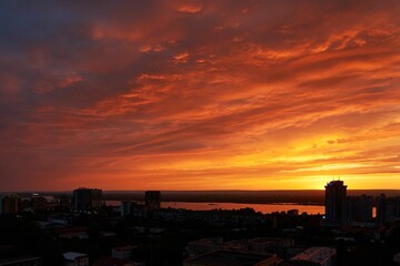 Beautiful shot of an orange sunset over the city