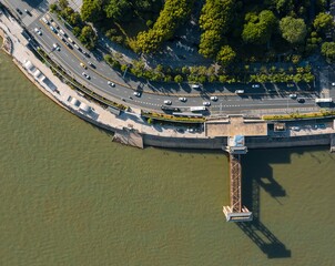 Naklejka premium Aerial view of the city road and cars along the Yangtze River in Wuhan, China