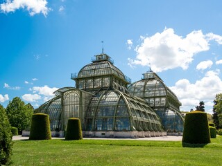 Fototapeta na wymiar Beautiful shot of the Palmenhaus greenhouse at Schonbrunn Palace in Vienna