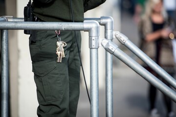 Bundle of keys hanging from the hip of a park ranger at the jail island of Alcatraz, San Francisco