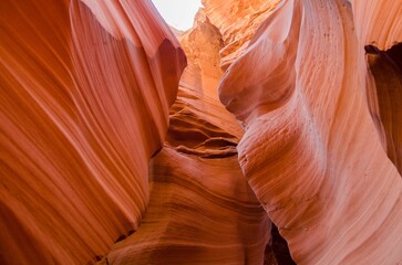 Closeup shot of a red cave illuminated by bright sunlight