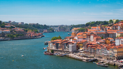 View of the Douro river and the coastline of the old city of Porto, Portugal.