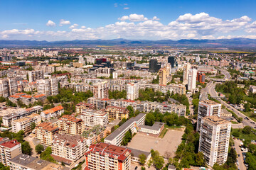 Fototapeta premium Aerial view from a drone of a district of the city next to the mountain, Sofia Bulgaria