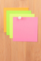 Colored Sticky Notes with Copyspace Pinned to the Wooden Message Board. To Do List Reminder in Office. Blank Memo Sticker at Work - Template. Empty Checklist - Mockup