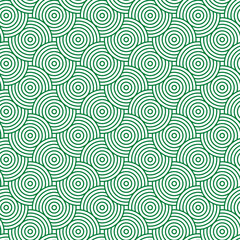 Seamless background pattern of green overlapping circles. Abstract green seamless pattern is perfect for decoration, wallpaper, wrapping paper, textiles