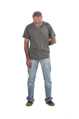 Fototapeta premium front view of middle aged man looking down on white background