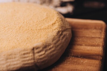 Dough on wooden board