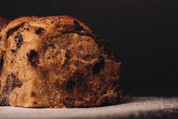 one slice of chocolate muffin cake is sitting on a plate
