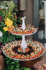 Array of dishes featuring various culinary delights are arranged upon a wooden table