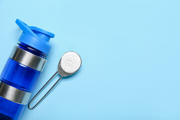 Scoop with amino acid supplement and bottle of water on color background