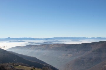 Landscape view of the mountains and hills against a blue sky in Sarajevo