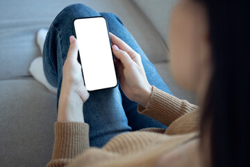 hands holding smartphone with mockup, transparent screen