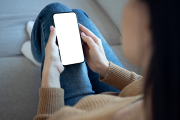hands holding smartphone with mockup, transparent screen