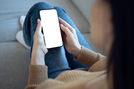 hands holding smartphone with mockup, transparent screen