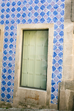 Closeup of door and tiled building in Lisbon Portugal