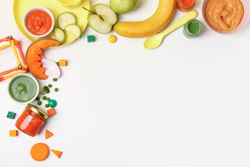 Composition with tasty baby food, fresh fruits and vegetables on white background